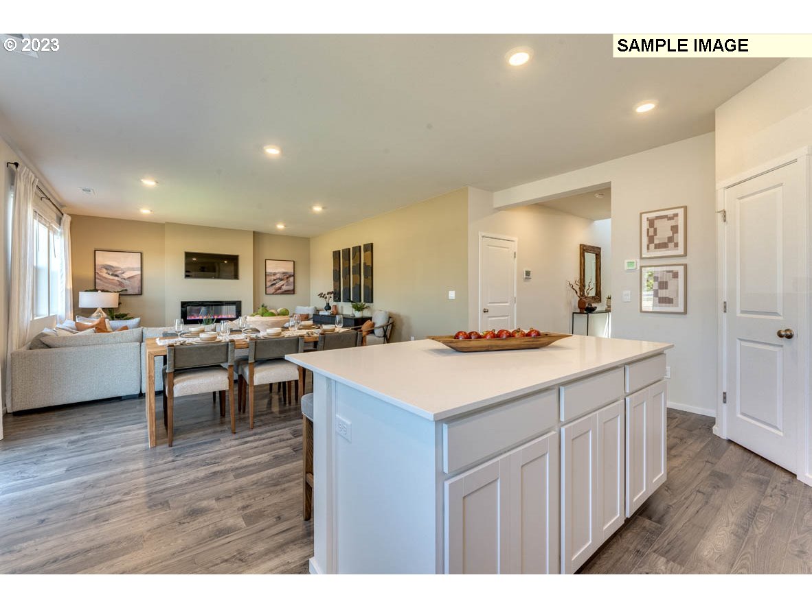 141 Cedar Springs Loop North Kalama, WA 98625 - Photo 13 of 31 a large kitchen with a table and chairs