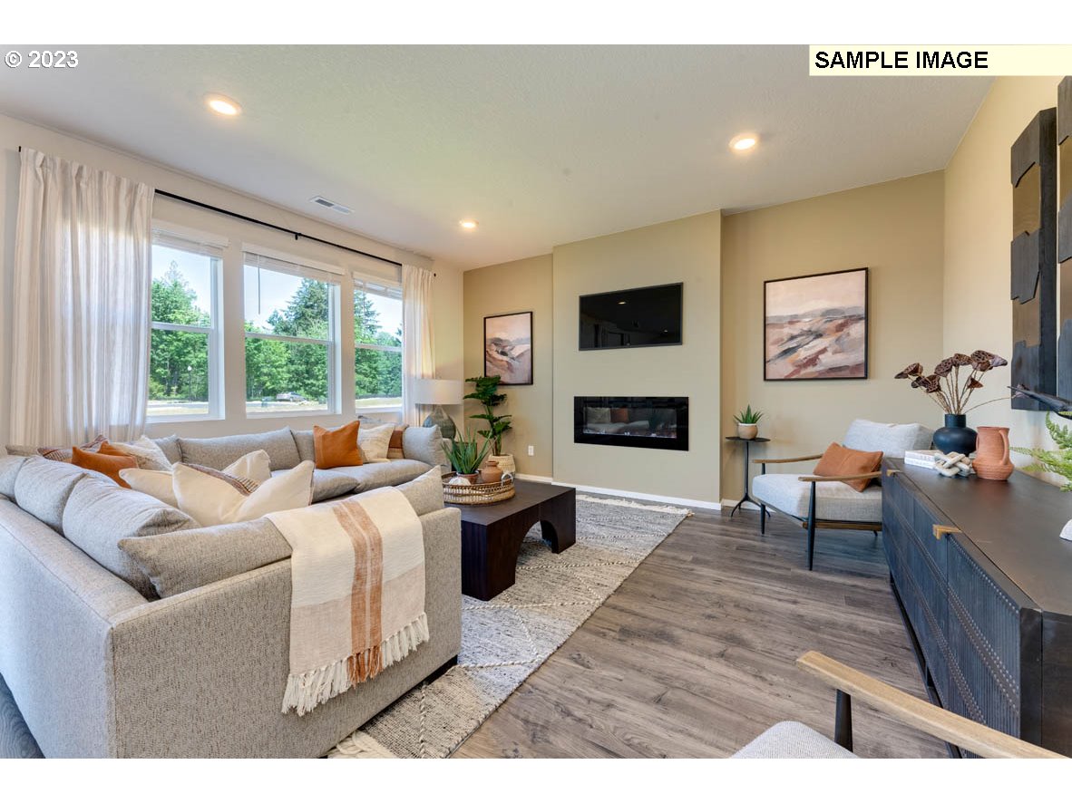 141 Cedar Springs Loop North Kalama, WA 98625 - Photo 15 of 31 a living room with furniture and a fireplace