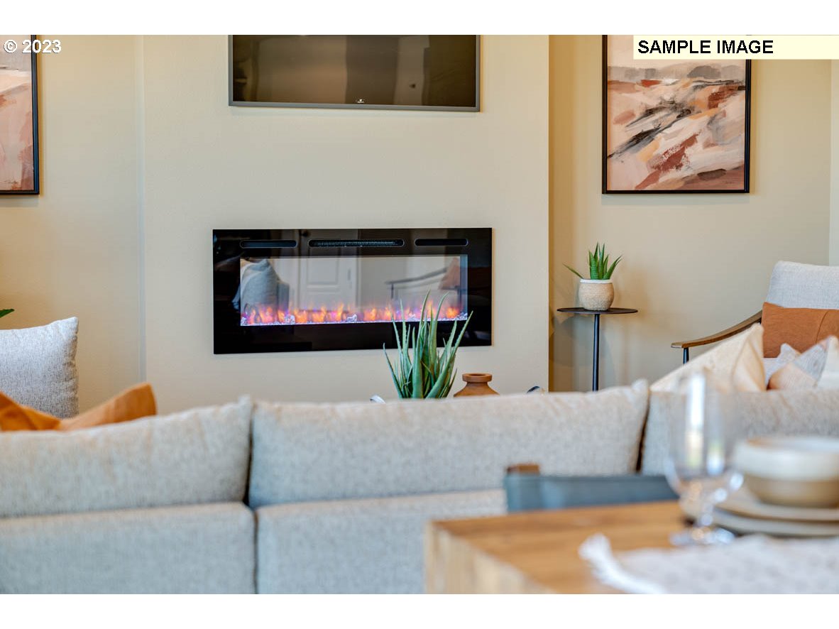 141 Cedar Springs Loop North Kalama, WA 98625 - Photo 17 of 31 a living room with furniture and a fireplace