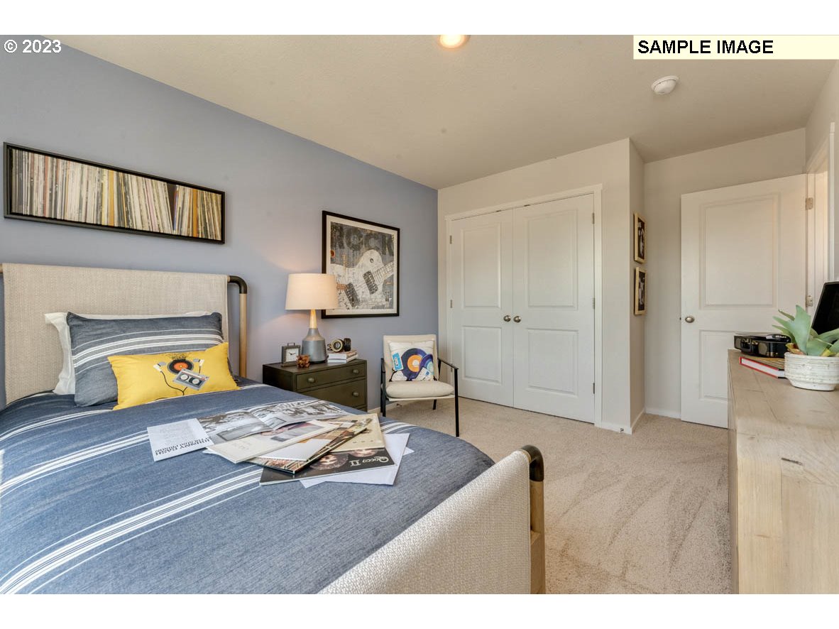 141 Cedar Springs Loop North Kalama, WA 98625 - Photo 20 of 31 a bedroom with a bed and a dresser