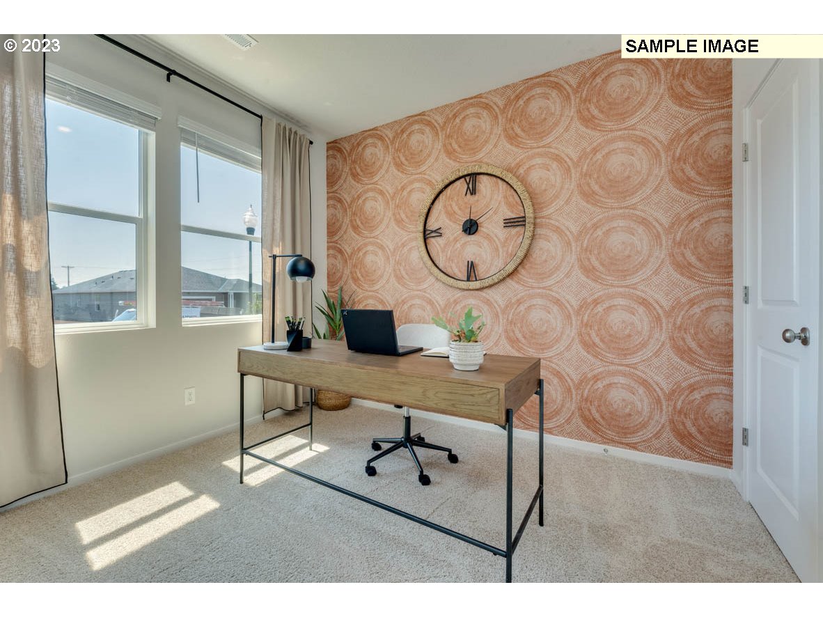 141 Cedar Springs Loop North Kalama, WA 98625 - Photo 6 of 31 a living room with furniture a clock and a window