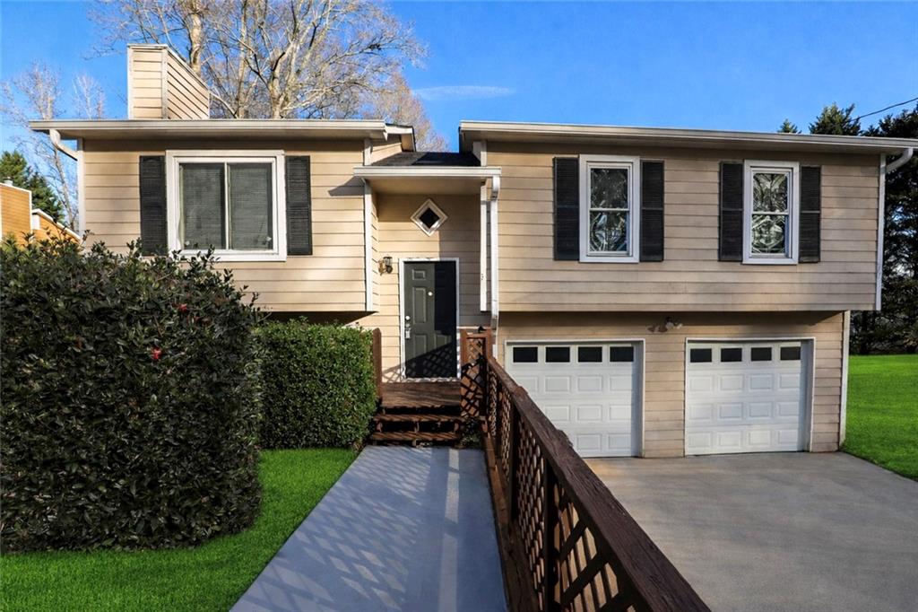206 Emily Drive Dallas, GA 30157 - Photo 2 of 17 a front view of a house with a yard