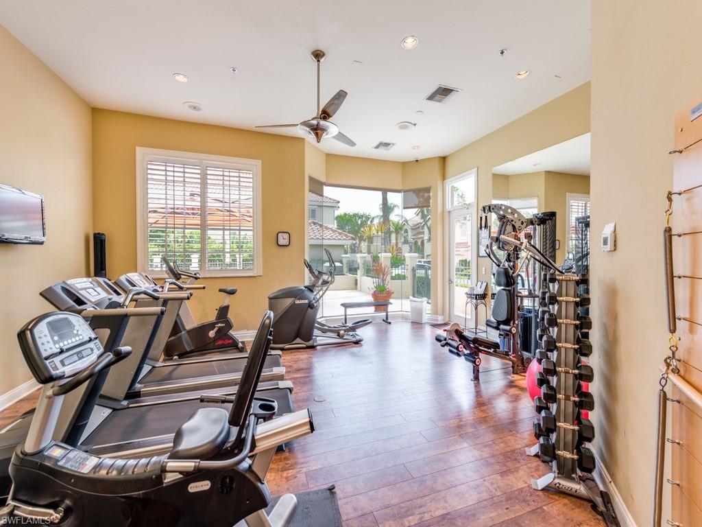 133 Colonade Circle Naples, FL 34103 - Photo 18 of 24 a view of a room with gym equipment