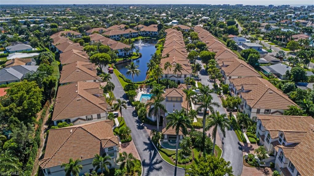 133 Colonade Circle Naples, FL 34103 - Photo 24 of 24 an aerial view of a city with lots of residential buildings