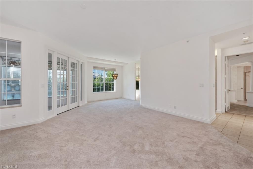 133 Colonade Circle Naples, FL 34103 - Photo 3 of 24 an empty room with windows