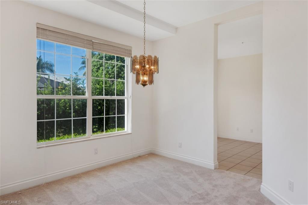 133 Colonade Circle Naples, FL 34103 - Photo 4 of 24 an empty room with windows