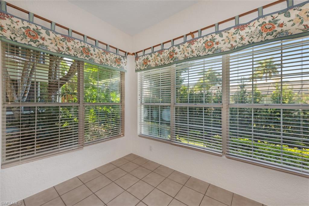 133 Colonade Circle Naples, FL 34103 - Photo 6 of 24 a view of backyard with green space