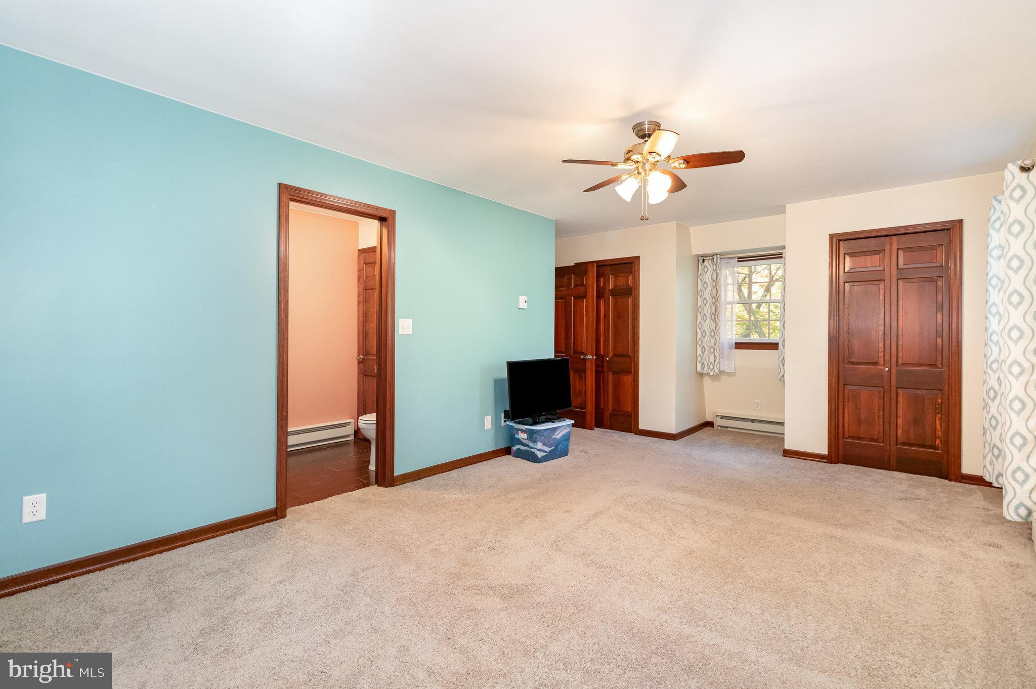 1327 Baltimore Road Shippensburg, PA 17257 - Photo 18 of 57 an empty room with closet and a chandelier fan
