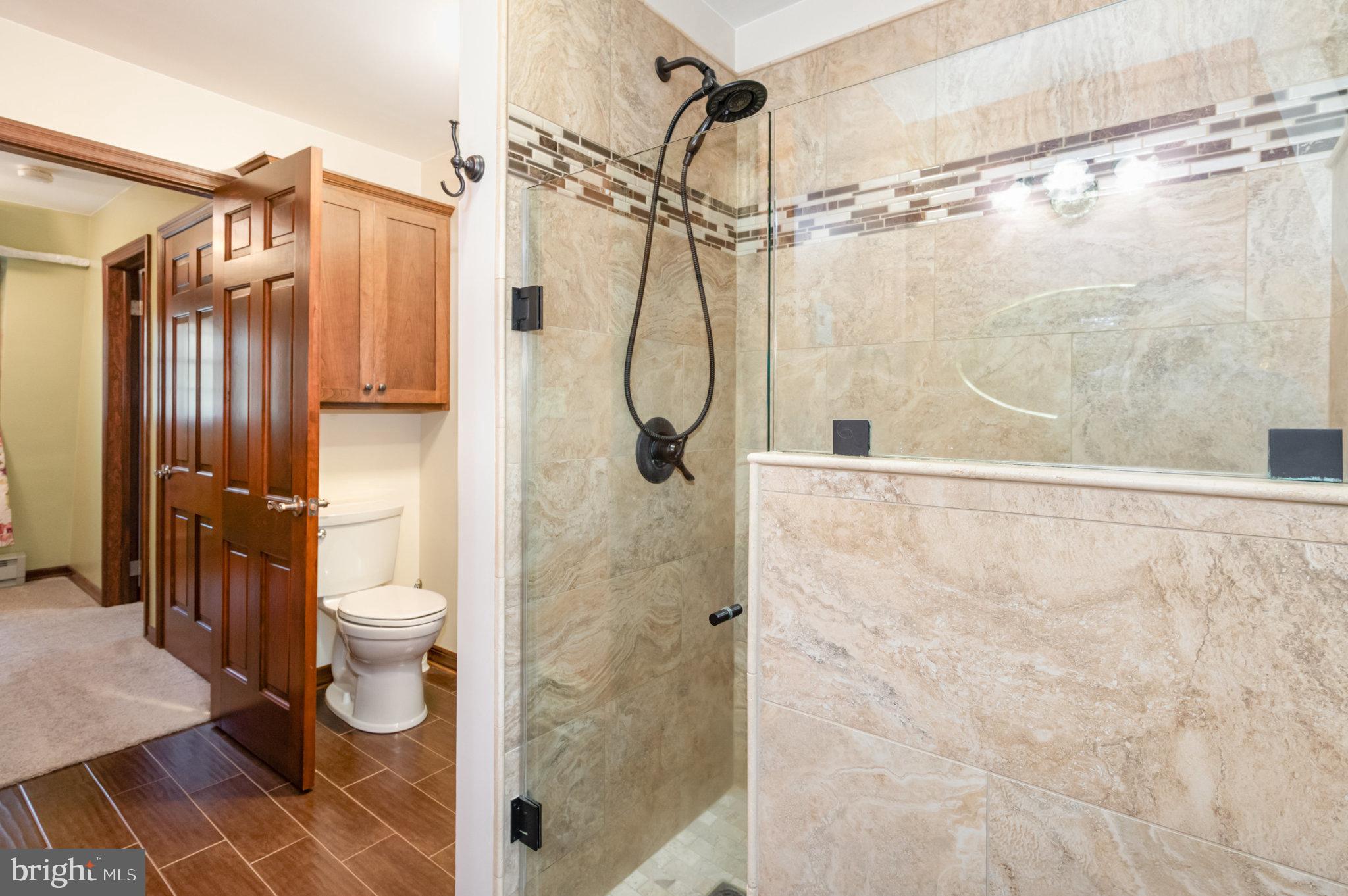 1327 Baltimore Road Shippensburg, PA 17257 - Photo 20 of 57 a bathroom with a shower toilet and sink