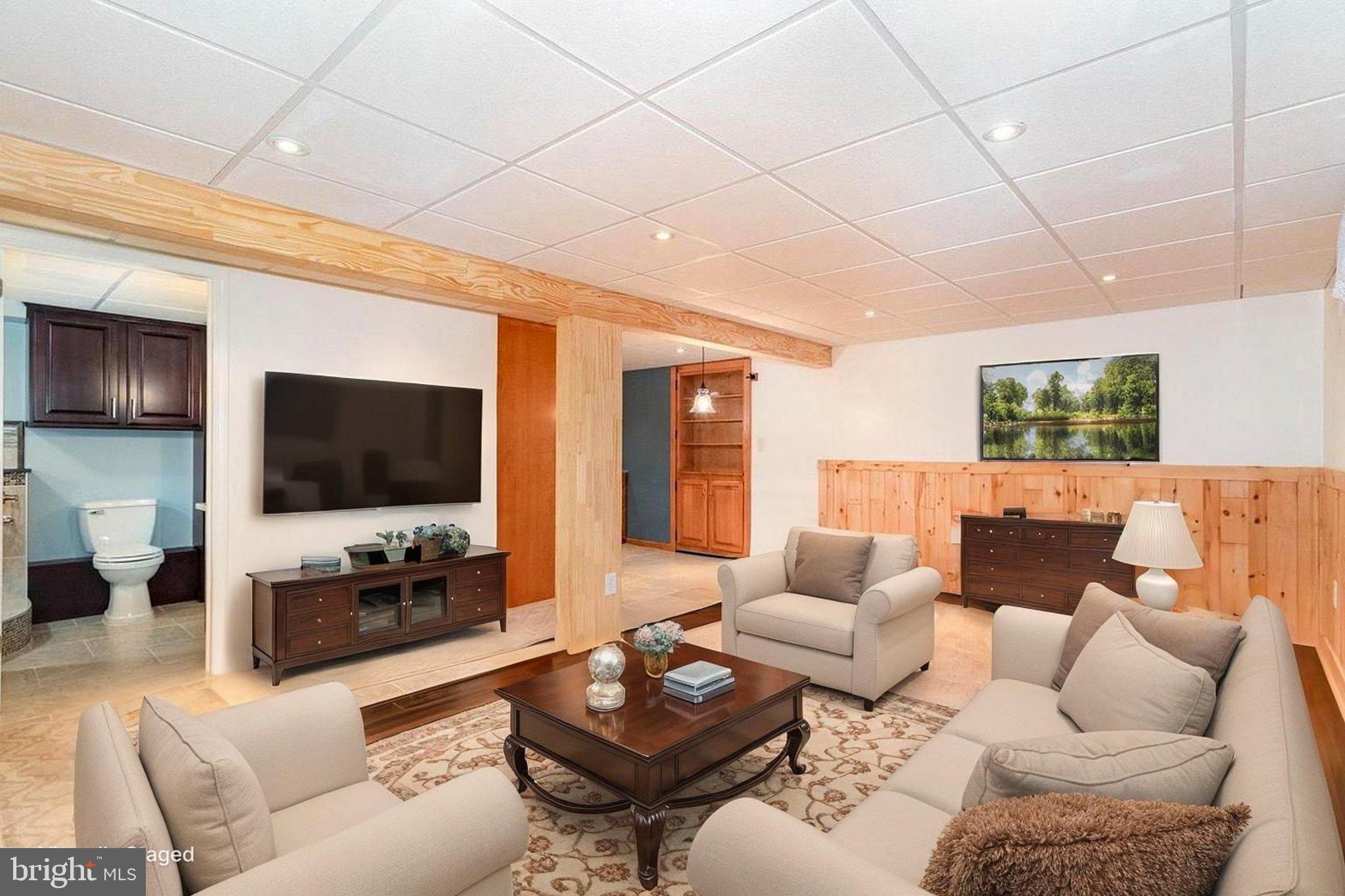 1327 Baltimore Road Shippensburg, PA 17257 - Photo 21 of 57 a living room with furniture and a flat screen tv