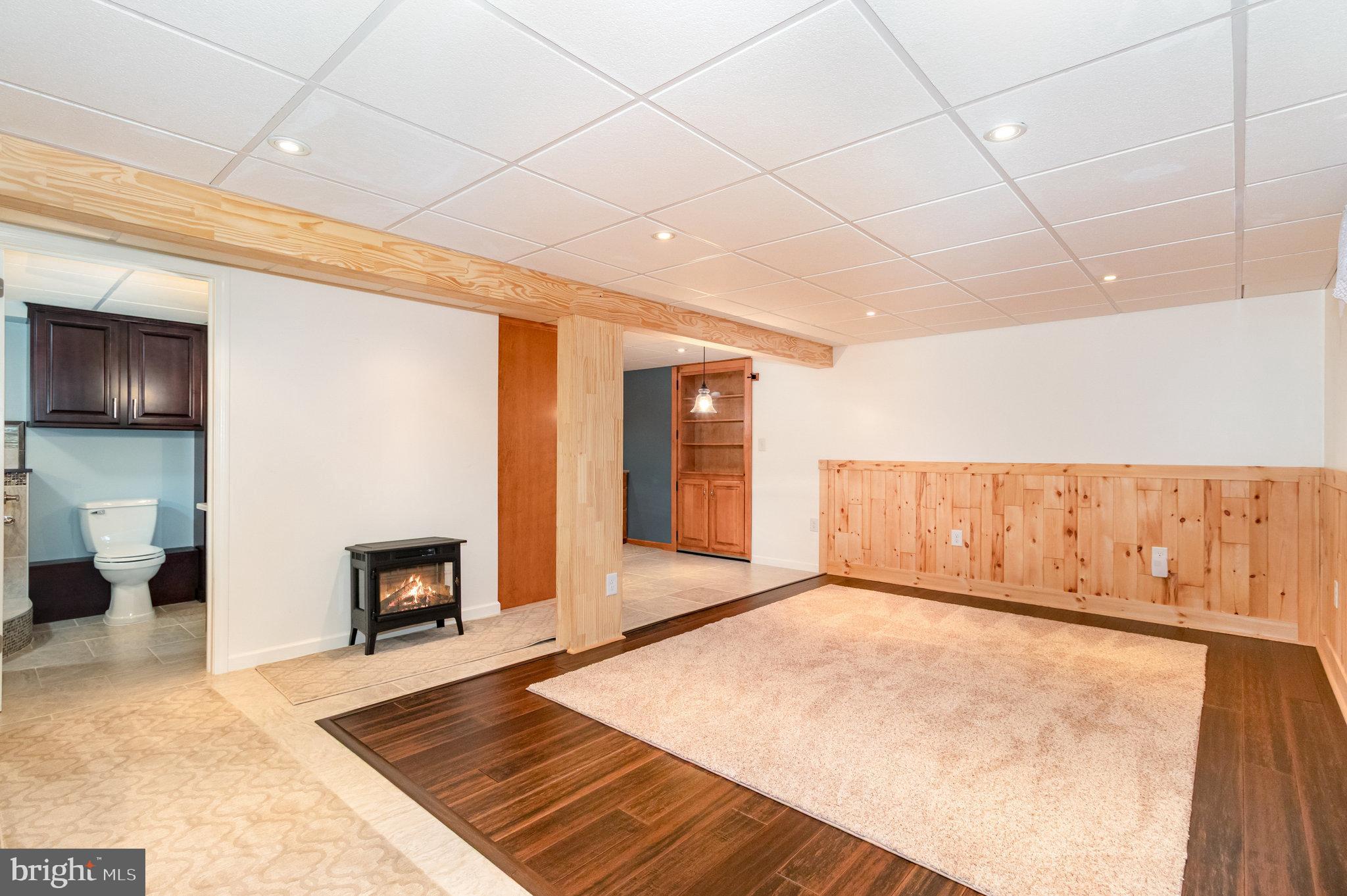 1327 Baltimore Road Shippensburg, PA 17257 - Photo 22 of 57 a view of an empty room with a fireplace
