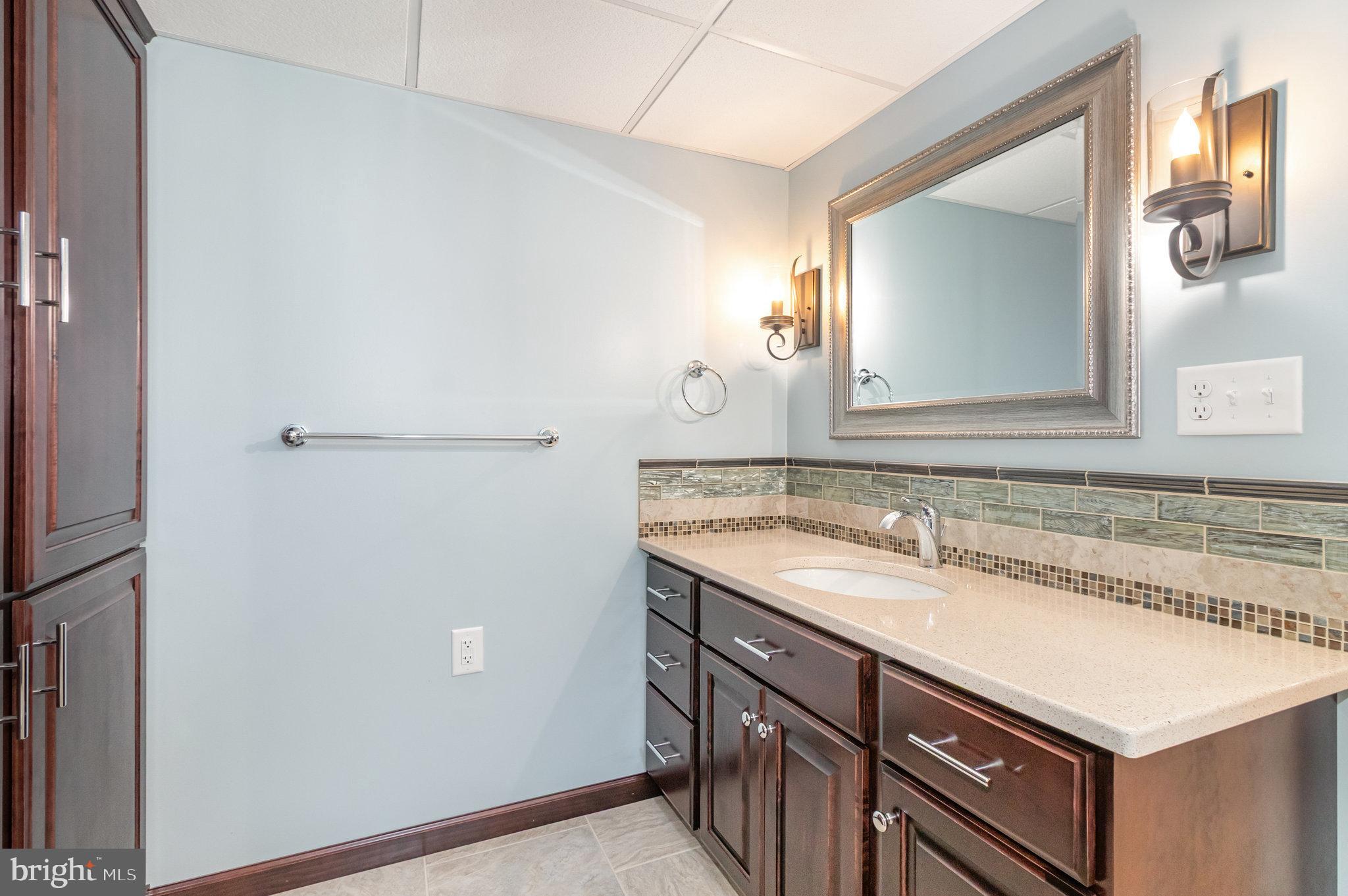 1327 Baltimore Road Shippensburg, PA 17257 - Photo 27 of 57 a bathroom with a sink and a mirror