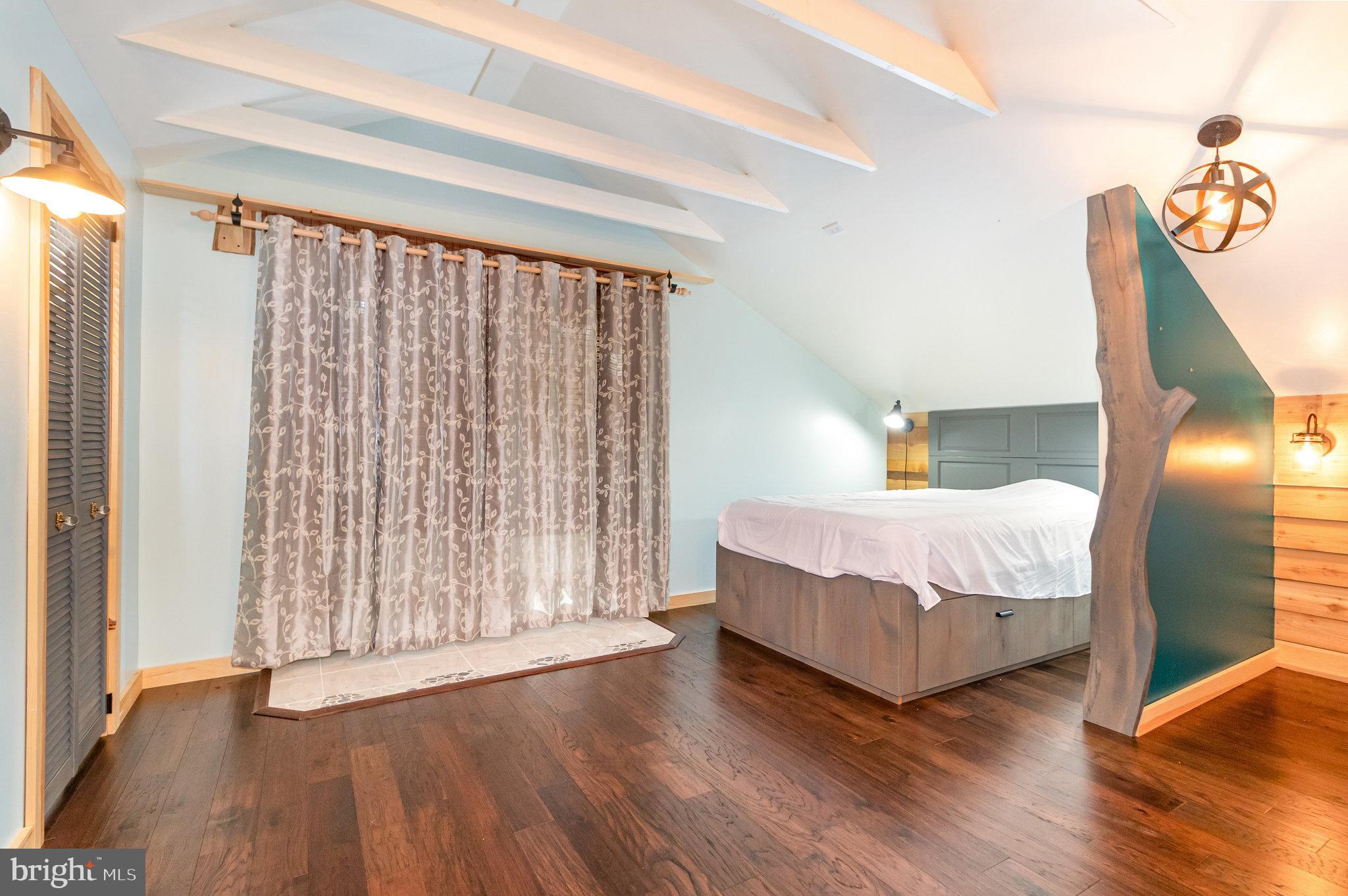 1327 Baltimore Road Shippensburg, PA 17257 - Photo 40 of 57 a bedroom with a bed and a window