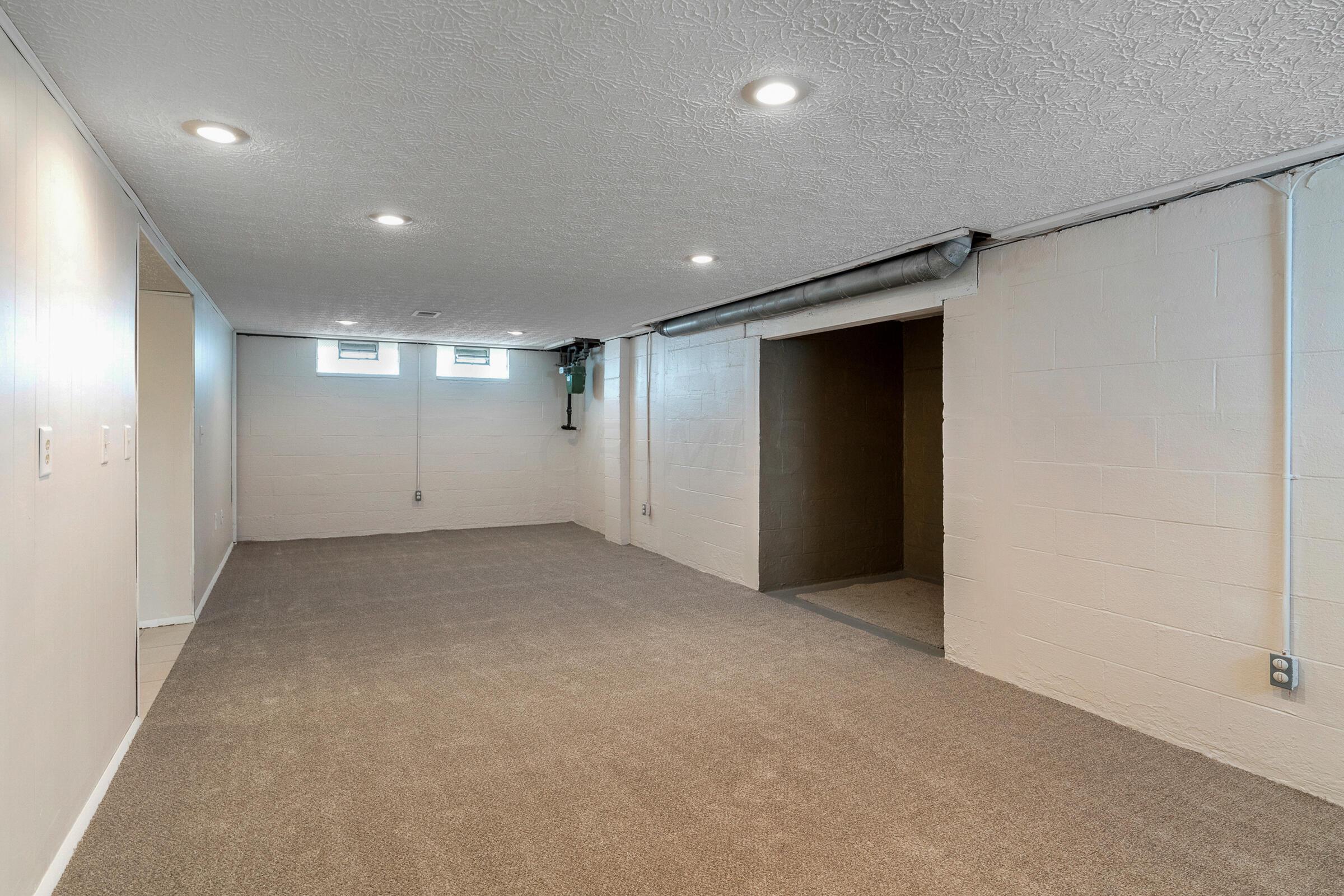 1271 Bryson Road Columbus, OH 43224 - Photo 25 of 31 Recreation room with new carpet