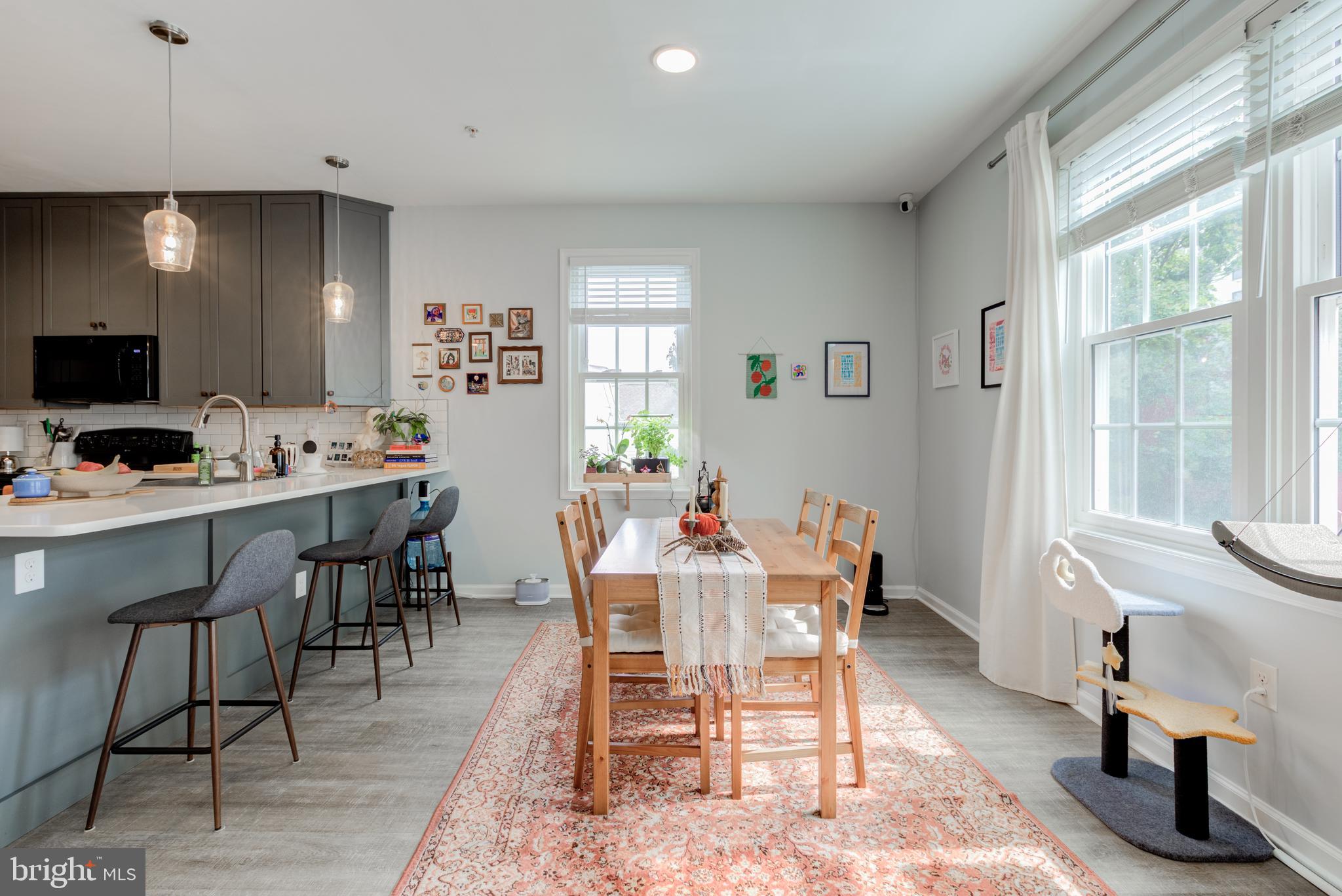 134 Bridge Street, Unit 201 Phoenixville, PA 19460 - Photo 11 of 33 a view of a dining room with furniture