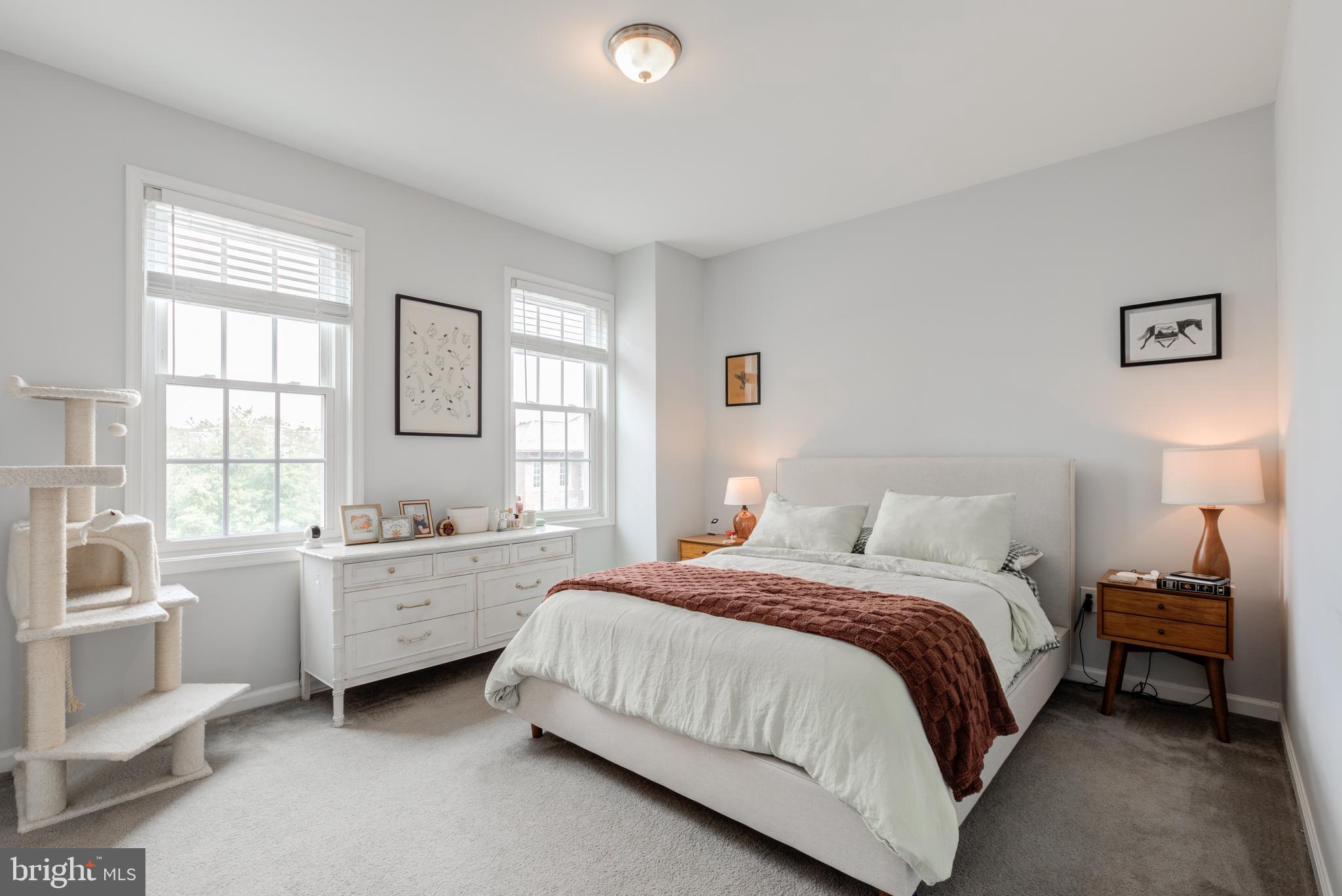 134 Bridge Street, Unit 201 Phoenixville, PA 19460 - Photo 22 of 33 a bedroom with a bed and a window
