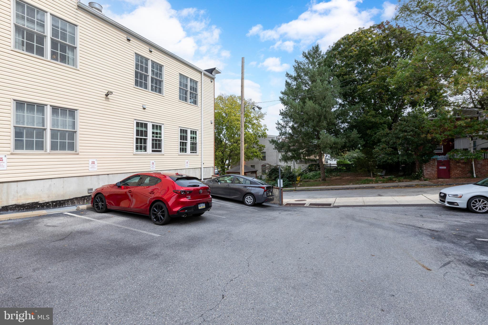 134 Bridge Street, Unit 201 Phoenixville, PA 19460 - Photo 31 of 33 a car parked in front of a house