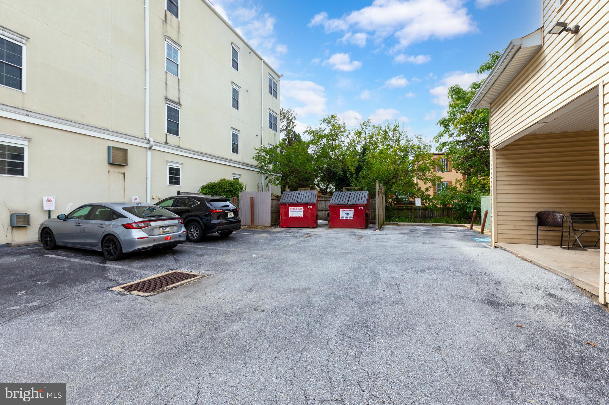 134 Bridge Street, Unit 201 Phoenixville, PA 19460 - Photo 32 of 33 a view of a cars in front of a house