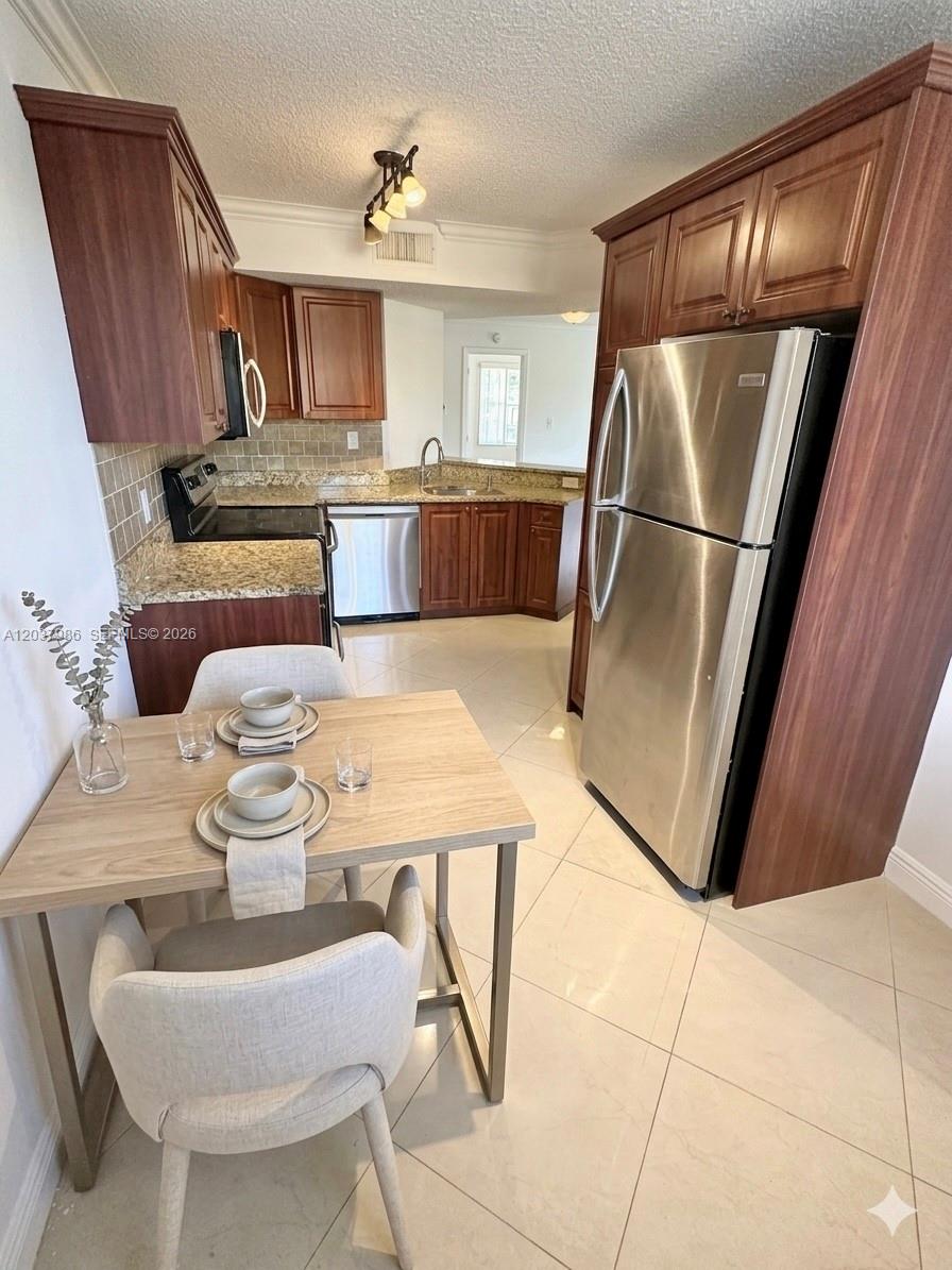 8955 Wiles Road, Unit 208 Coral Springs, FL 33067 - Photo 5 of 29