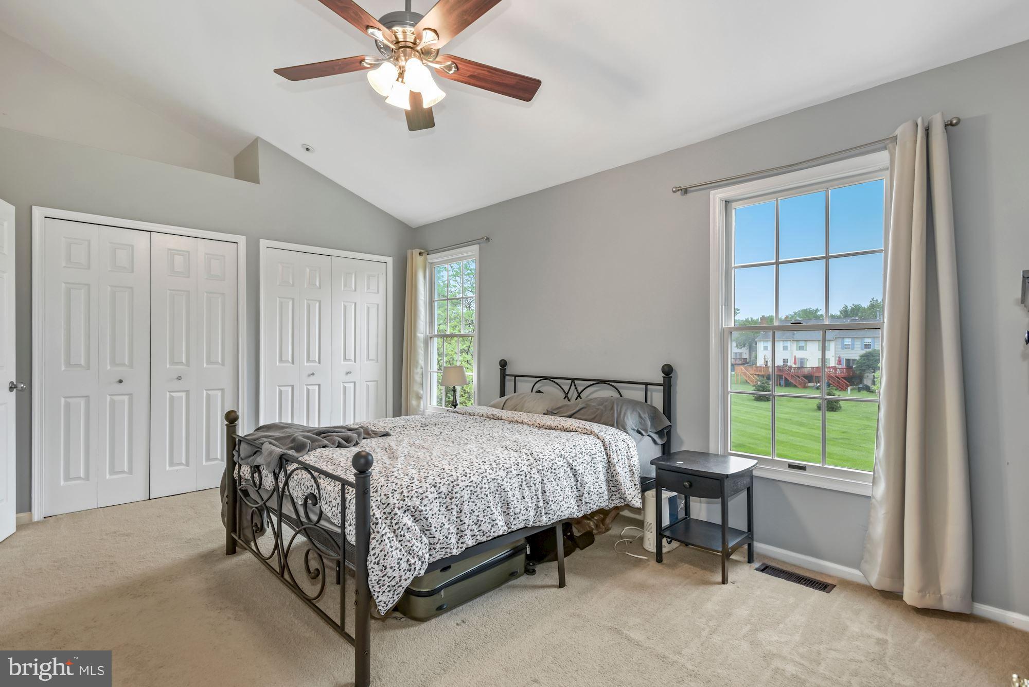20121 Crew Square Ashburn, VA 20147 - Photo 21 of 36 a bedroom with a bed and a window