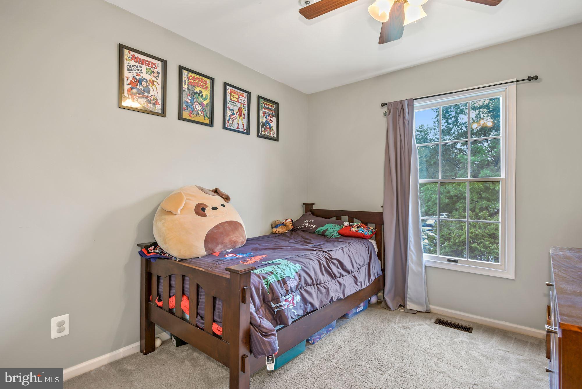 20121 Crew Square Ashburn, VA 20147 - Photo 24 of 36 a bedroom with a bed and a window