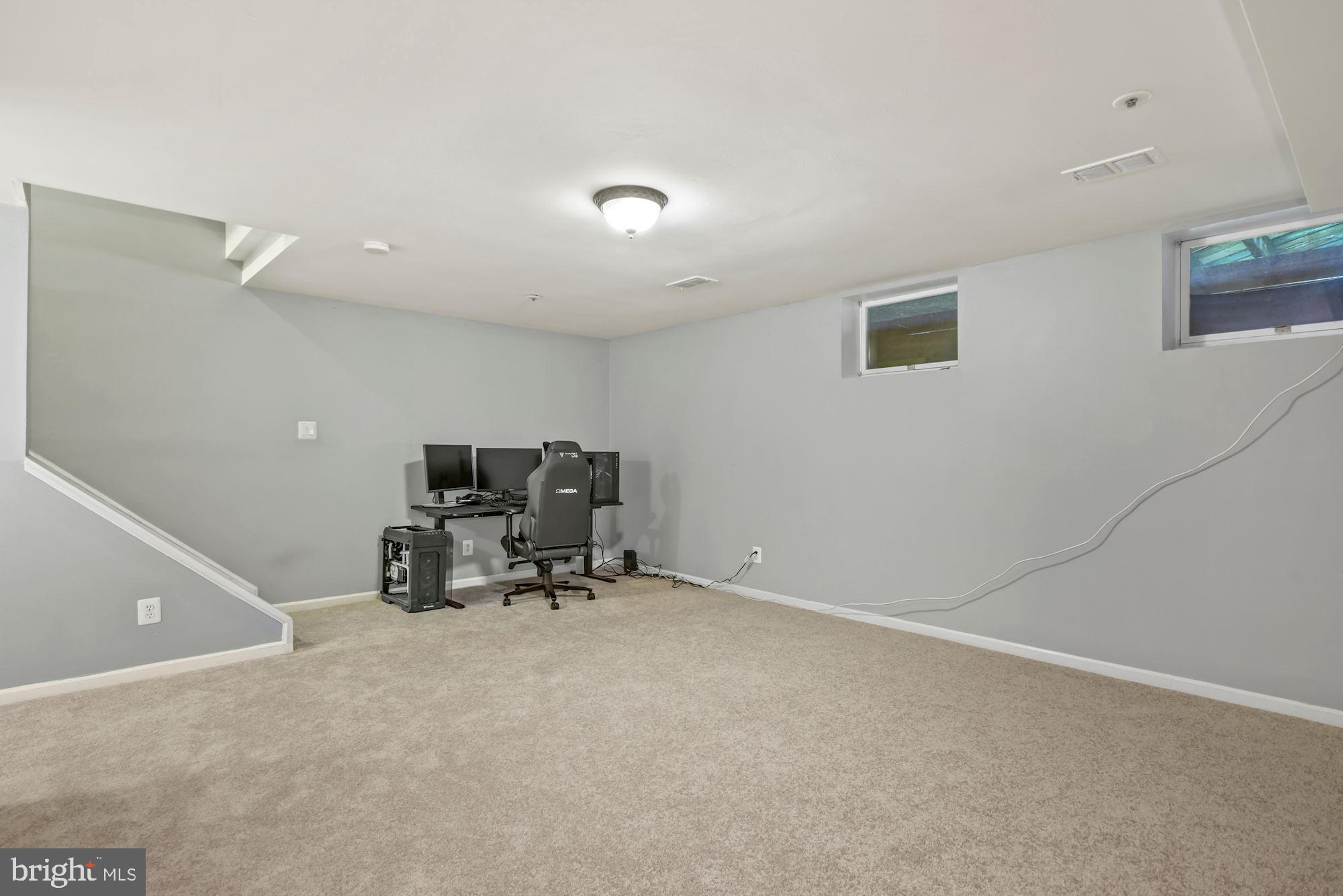 20121 Crew Square Ashburn, VA 20147 - Photo 28 of 36 a view of a room with furniture and a window