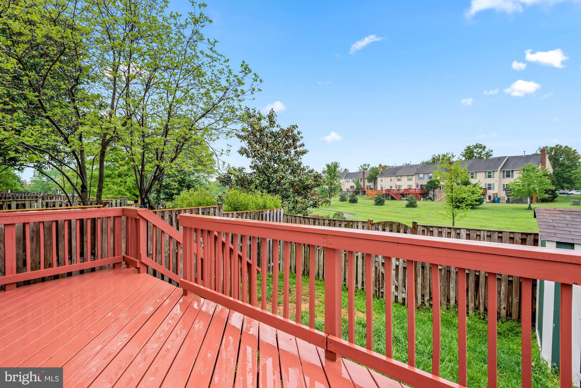 20121 Crew Square Ashburn, VA 20147 - Photo 31 of 36 a view of a wooden roof deck