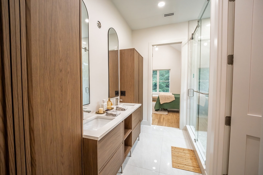 20 Merrifield Road North Bernardston, MA 01337 - Photo 34 of 41 a en suite bathroom with a double vanity sink and a mirror