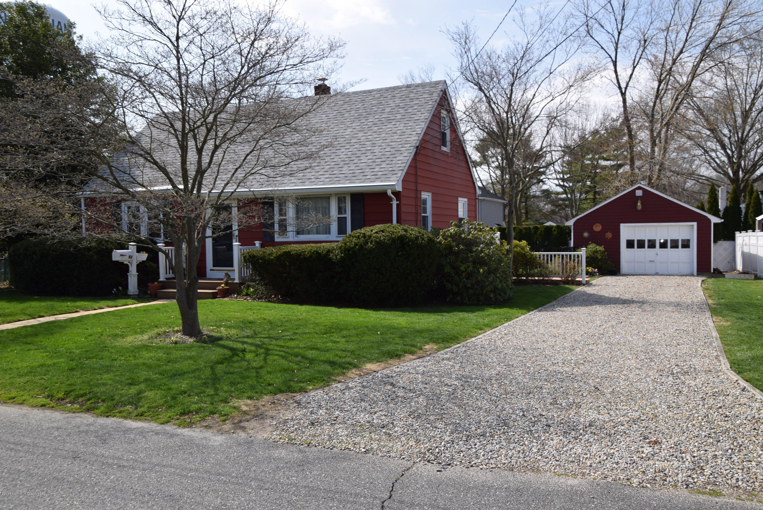 51 Narrumson Road Manasquan, NJ 08736 - Photo 1 of 17 a house view with a garden space