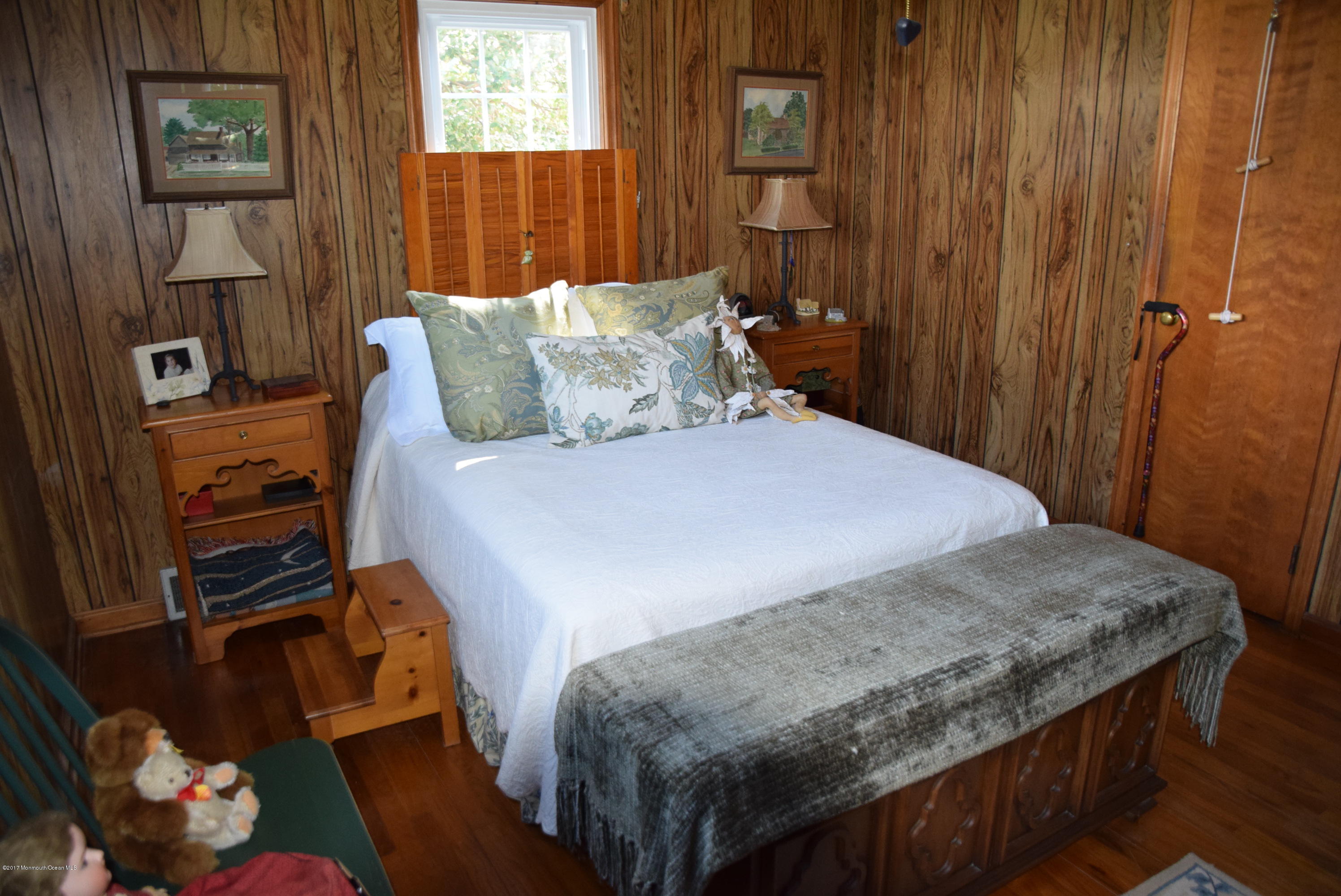 51 Narrumson Road Manasquan, NJ 08736 - Photo 12 of 17 a bedroom with a bed and a window