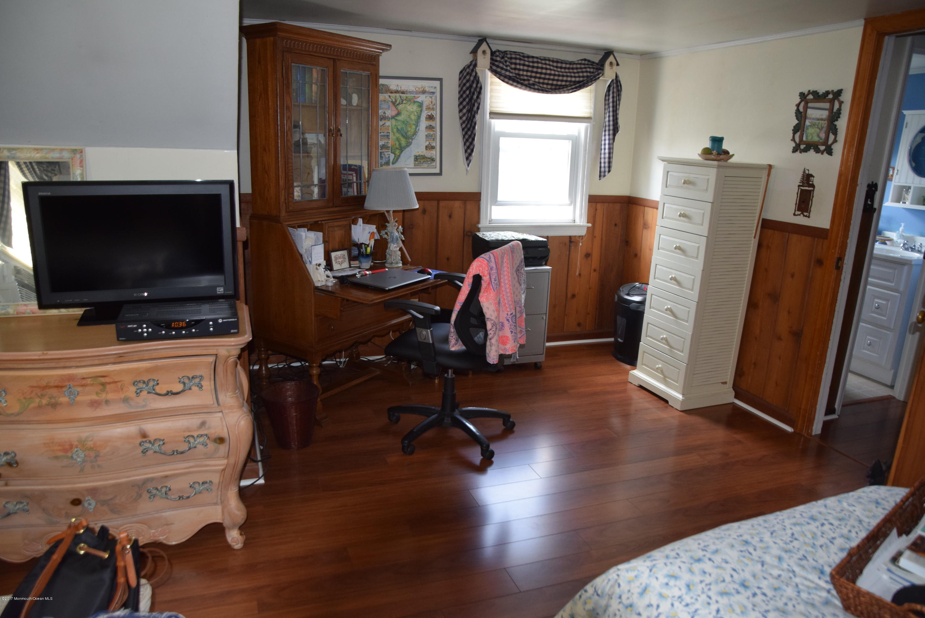 51 Narrumson Road Manasquan, NJ 08736 - Photo 17 of 17 a view of a workspace with furniture and a window