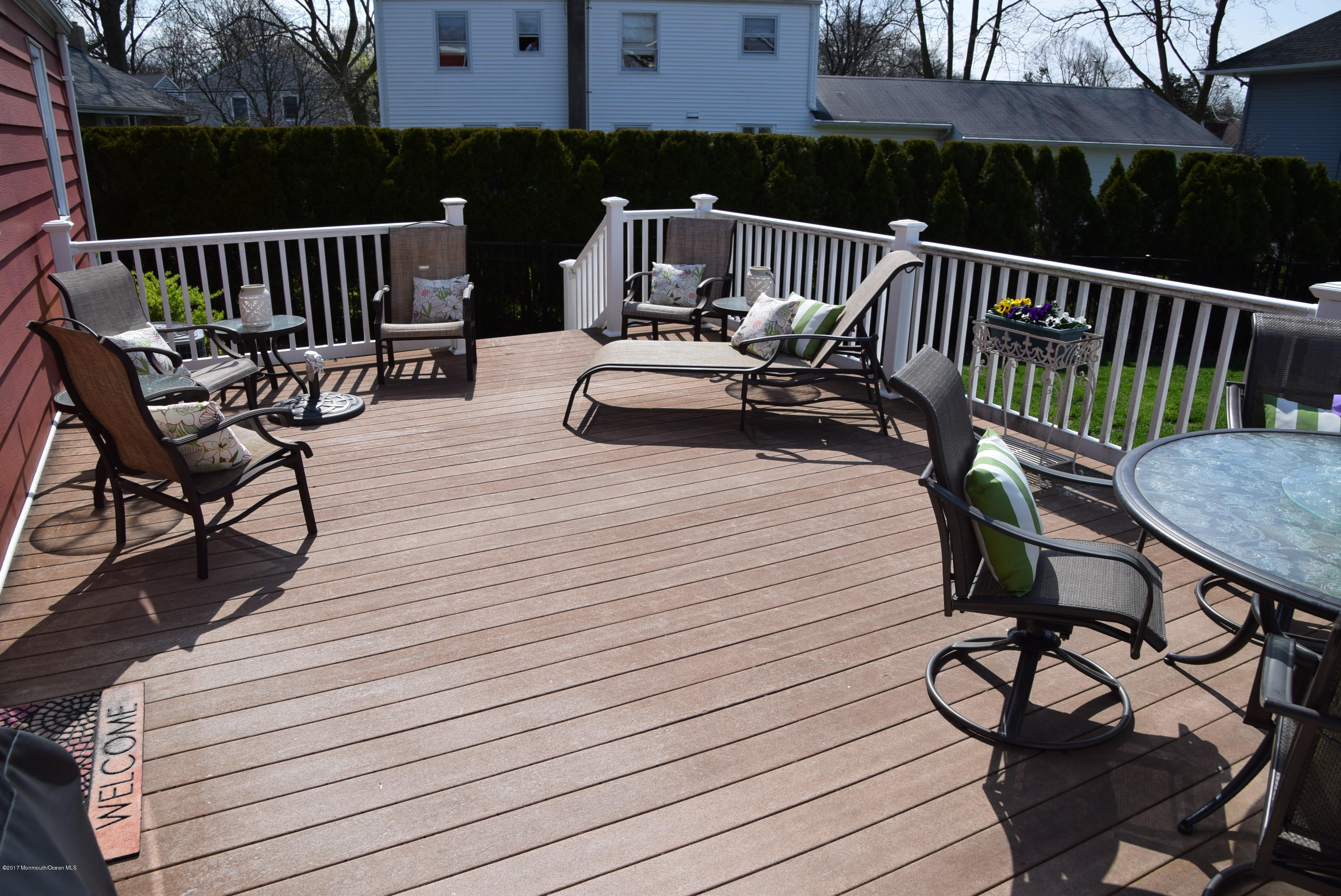 51 Narrumson Road Manasquan, NJ 08736 - Photo 6 of 17 a view of deck with chairs and wooden floor