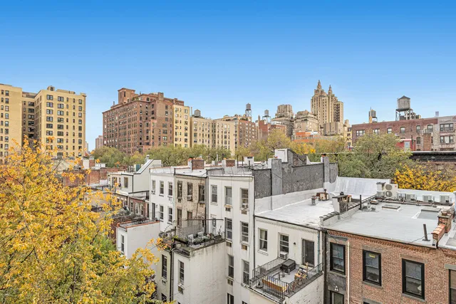 a view of city with tall buildings