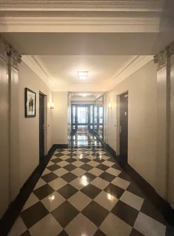 a view of a room with windows