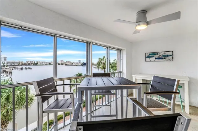 a view of a balcony with furniture