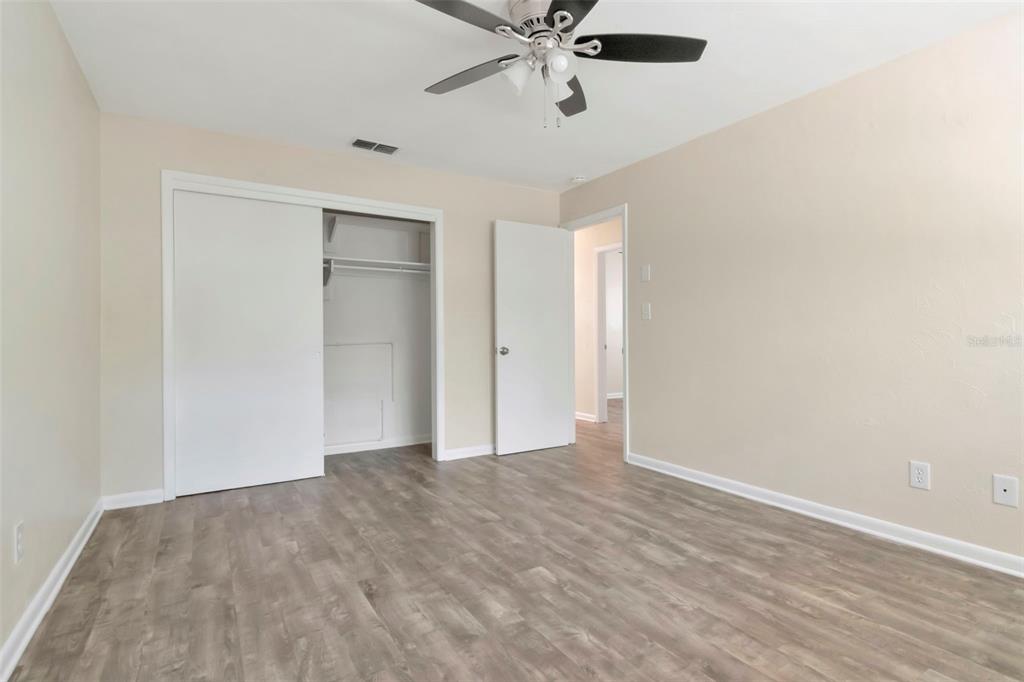 126 Kingsway Road Brandon, FL 33510 - Photo 31 of 42 a view of an empty room and wooden floor
