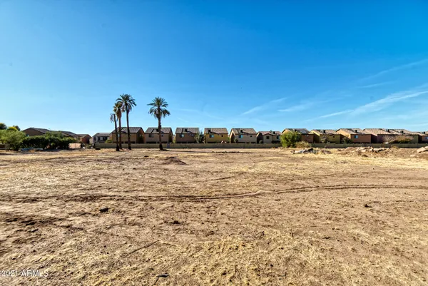 a view of a lake with a yard