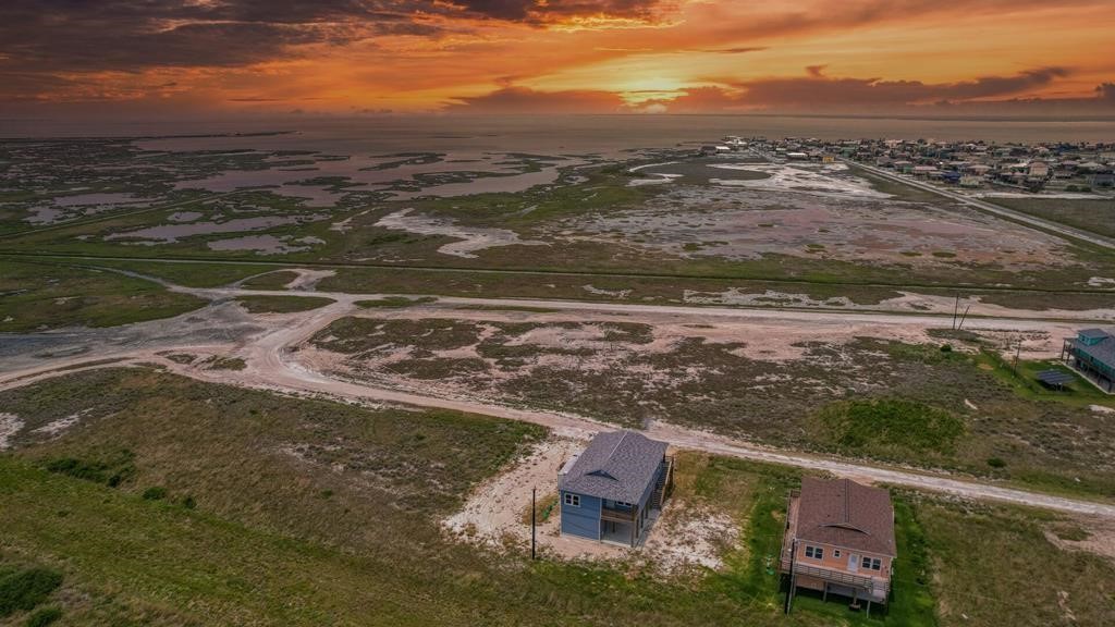 13-14 Bayview Loop Rockport, TX 78382 - Photo 2 of 26 an aerial view of residential houses with outdoor space