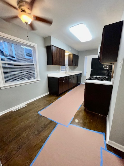 2227 Forest Avenue North Riverside, IL 60546 - Photo 3 of 12 a living room with stainless steel appliances kitchen island granite countertop a stove and a refrigerator