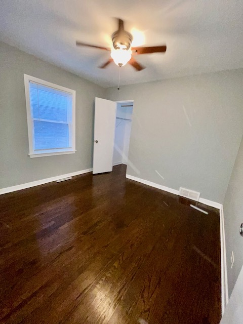 2227 Forest Avenue North Riverside, IL 60546 - Photo 5 of 12 a view of an empty room with wooden floor and a ceiling fan