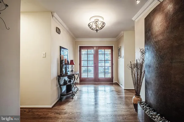 a view of a livingroom with furniture and a window