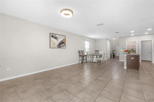 a view of kitchen with furniture and window