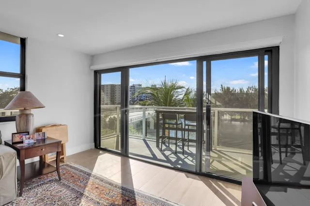 a view of building with lot of large windows