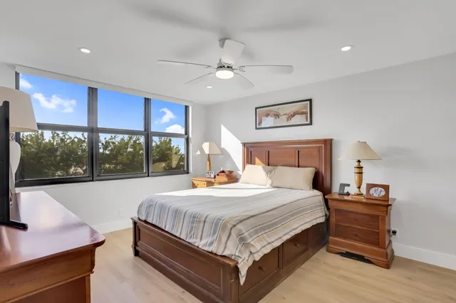 a view of a swimming pool with a lounge chair