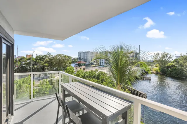 a view of balcony with furniture