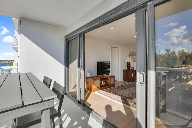 a view of living room kitchen and dining room