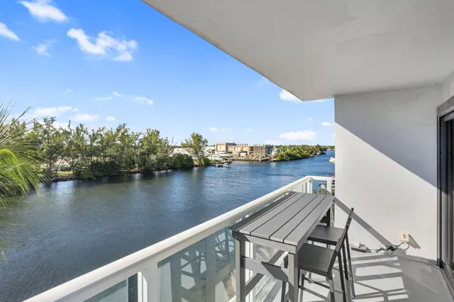 a view of a lake from a balcony
