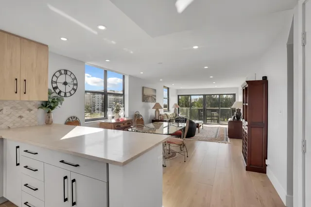 a view of a room with a large window