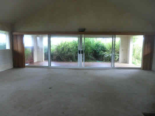 4439 Kaloloku Road, Unit A Kapaa, HI 96746 - Photo 3 of 17 a view of room with large windows