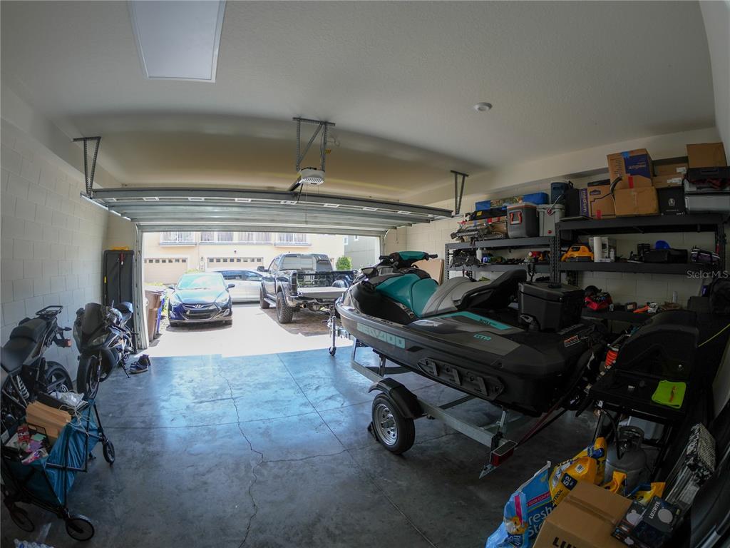 2451 Varenna Loop Kissimmee, FL 34741 - Photo 4 of 11 a view of a room with gym equipment